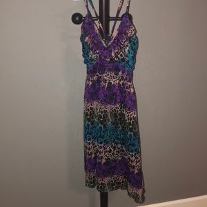Multi color dress. With adjustable straps.